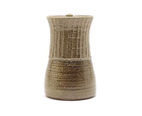 A Robert Fishman at Leach Pottery, stoneware vase and cover, with waisted body with a faceted band, impressed artists monogra