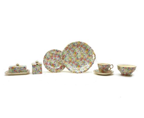 A Royal Winton 'Marion' porcelain tea set for ten, 20th century, comprising cups, saucers, side plates, a sugar bowl, a butte