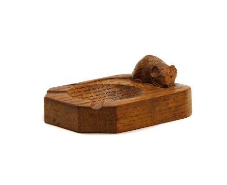 A Robert Mouseman Thompson oak ashtray of shaped rectangular form, carved with signature mouse. 10cm x 7.5cmCondition report: