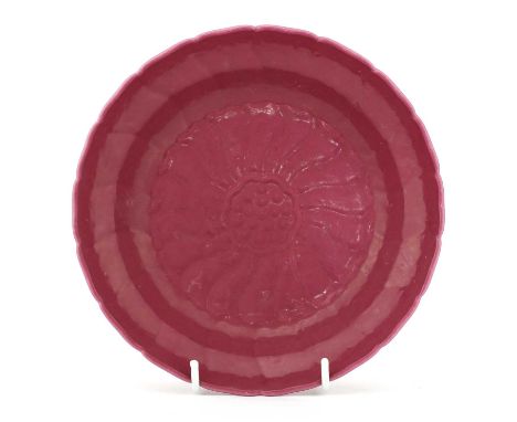A Chinese ruby pink enamelled dish, in the form of a chrysanthemum, with a lobed rim emitting petals, six-character Yongzheng