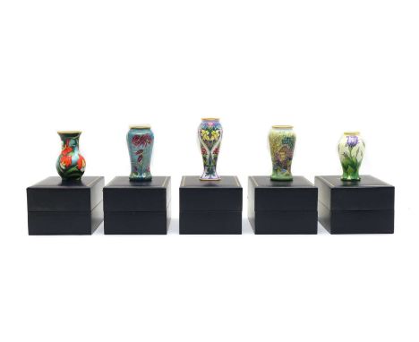 Five small modern Moorcroft enamel vases, 'Fleur Rouge' 41/100, 'Lisianthus' 99/100, '...... Spring Flowers' 34/250, 'Eve's G
