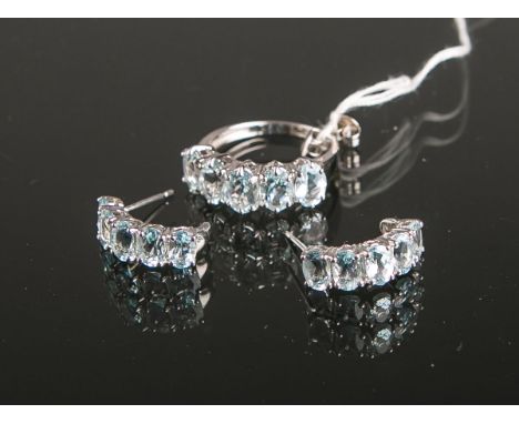 3-teiliges Schmuck-Set 585 WG (KNJ), bestehend aus: 1x Paar Ohrringe u. 1x Ring, jeschauseitig besetzt m.: 5x hellblauen oval