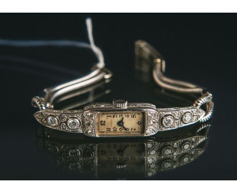 Chopard - Damenuhr "Eszeha" 585 WG (Schweiz, Art déco, 20er Jahre), Besatz m. 4Altschliffdiamanten je ca. 0.10 ct u. 16 klein