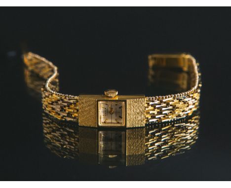 Carib - Damenarmbanduhr 585 GG/WG (1950/60er Jahre), bicolor, helles Zifferblatt m.goldenen Indizes, Gehäuse ca. 2,4 x 1,1 cm