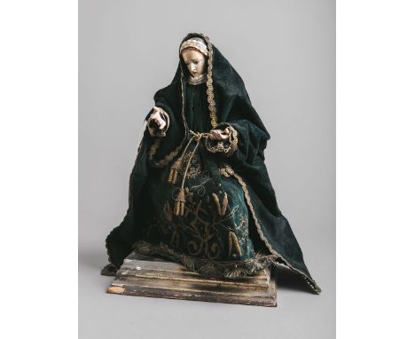 Schwarze Madonna (Italien, 18./19. Jh.), Holzkorpus, Hände, Kopf u. Füße fein geschnitztu. polychrom gefasst, Glasaugen, Klei
