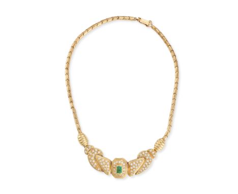 AN EMERALD AND WHITE GEMSTONE NECKLACE the stylised pendant set with an octagonal step cut emerald and round cut white gemsto