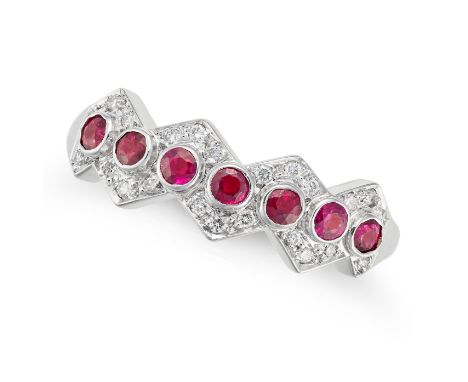 NO RESERVE - A RUBY AND DIAMOND RING in 18ct white gold, set with a row of round cut rubies accented by round cut diamonds, f