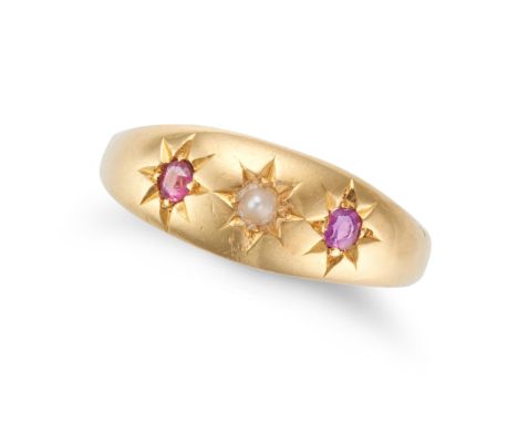 AN ANTIQUE VICTORIAN RUBY AND PEARL GYPSY RING in 22ct yellow gold, set with a pearl between two cushion cut rubies, full Bri