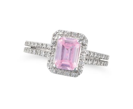 NO RESERVE - A PINK CUBIC ZIRCONIA AND DIAMOND RING in 9ct white gold, set with an octagonal step cut pink cubic zirconia in 