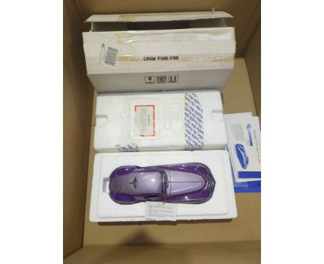 Franklin Mint, a boxed 1:24 scale harder to find B11XK61 1939 Duesenberg Coupe &ldquo;Simone&rdquo; in two-tone metallic purp