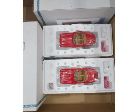 Franklin Mint. A boxed pair of 1:24 scale 1960 Mercedes-Benz 300SL Roadster Models both in Red with Brown interior. Both come