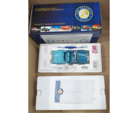 Franklin Mint, a boxed 1:24 scale B11UL60 1956 Chevrolet Bel Air in two tone Blue with two tone Blue interior. Complete with 