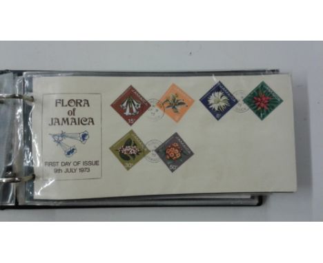 Two albums of stamps and First Day covers