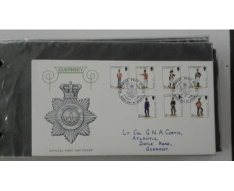 Two albums of stamps and First Day covers