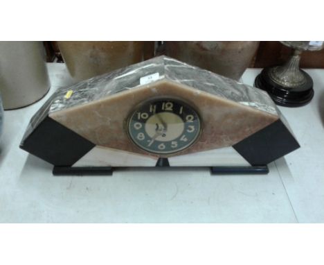 An Art deco marble single hole mantel clock