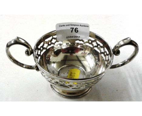 A Sterling silver twin handled cup