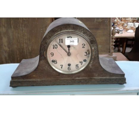 A chiming mantel clock AF