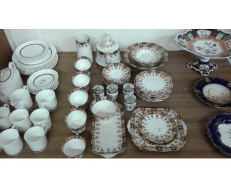 A quantity of early 20th Century gilt decorated tea and dessertware and four Royal Worcester egg coddlers