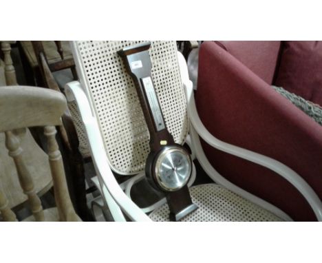 A mahogany banjo shaped barometer thermometer 