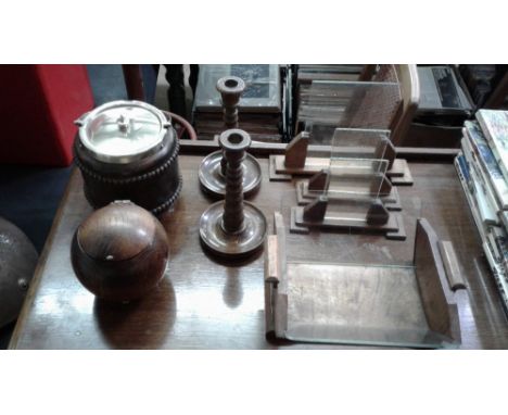 A quantity of wooden ware to include two biscuit barrels; a book trough; picture frames etc.
