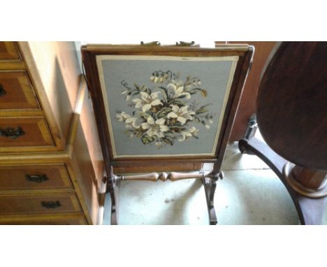 A tapestry work and mahogny framed firescreen