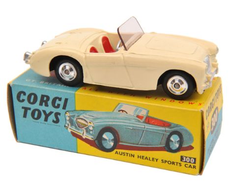 Corgi Toys Austin Healey Sports Car (300). An example in cream with red seats. Boxed with Corgi leaflet. Vehicle VGC-Mint ver