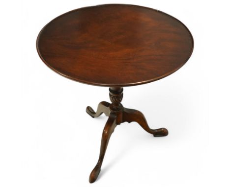 Georgian design mahogany tripod table, circular top with raised lip edge, turned pedestal with twist baluster on three out sp