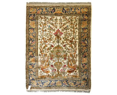 Kashan style rug, twin peacocks flanking a large decorative urn, motifs tree of life style, multiple borders with fine floral