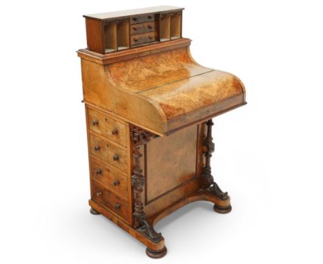 Victorian figured walnut piano top Davenport desk, hidden compartment lifting to reveal small drawers and pigeonholes, the pi