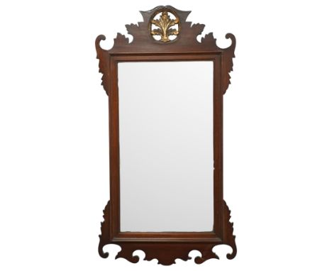 Chippendale design mahogany fretwork wall mirror, the pediment pierced and carved with acanthus leaf motifs, bevelled mirror 