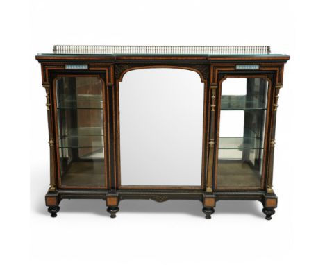 Victorian amboyna and ebonised credenza with glass top, the freeze fitted with two Wedgewood plaques and brass beading above 