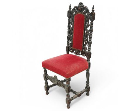 Carolean design 19th oak hall chair with lion pediment over upholstered back, turned and squared supports with pierced and ca