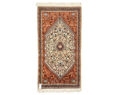 Persian design wool rug, 'Tarange-Lachak' medallion and corner design on a white and pink field framed by pink borders Dimens