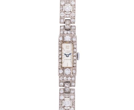 Art Déco Schmuckuhr mit zahlreichen Diamanten von zus. ca. 5 ct, Achtkant- u. Altschliff, ca. LGW-GW (I-K)/SI-P1, Platin, Sch