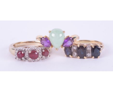 Three 9ct yellow gold rings to include one set with a pear cut cabochon jade &amp; two pear cut amethysts, 2.62gm, size M, a 