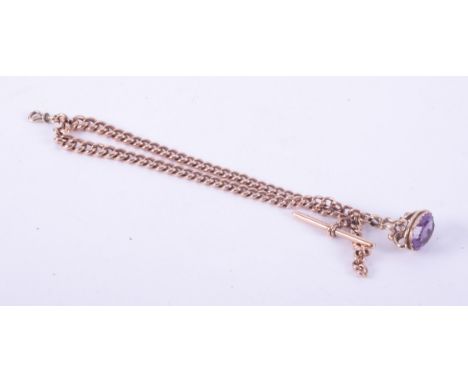 A 9ct rose gold albert chain with T-bar, hallmarked on links and T-bar, with a yellow gold (not hallmarked or tested) fancy f