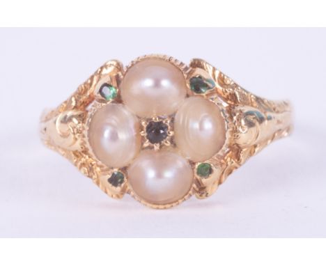 An antique yellow gold ring (not hallmarked or tested) set with pearls &amp; small round cut emeralds, engraved shoulders &am