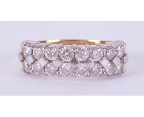 An 18ct yellow gold &amp; platinum (not hallmarked or tested) two row ring set with round brilliant cut diamonds, 4.74gm, siz