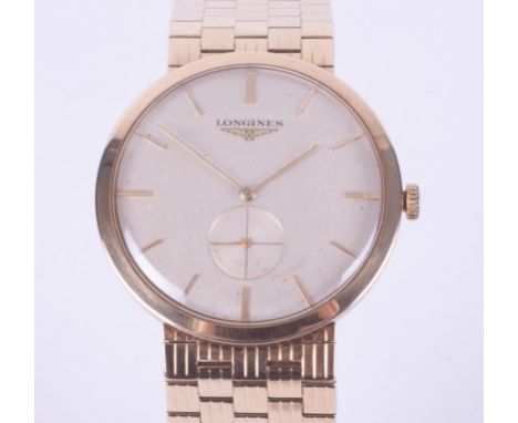 Longines, a vintage 9ct yellow gold gent's Longines wristwatch with chronometer, manual wind, currently working, 52.77gm, com