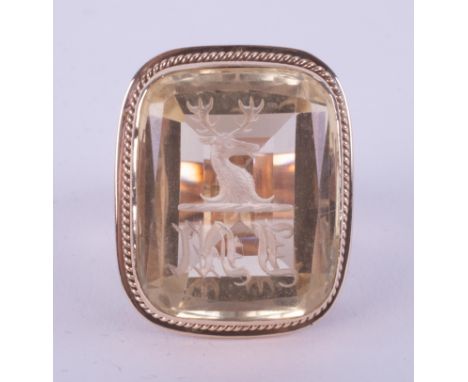 An impressive &amp; ornate 9ct rose &amp; yellow gold seal ring set with a pale yellow citrine engraved with a stags head and