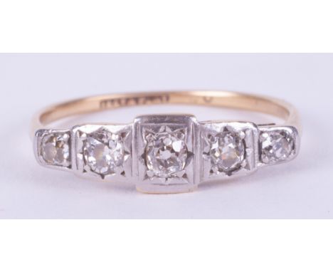 An 18ct yellow gold &amp; platinum Art Deco five stone diamond ring set with old round cut diamonds, 2.46gm, size R 1/2 .