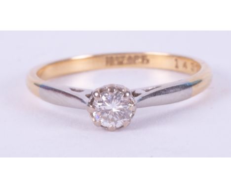 An 18ct yellow gold &amp; platinum diamond solitaire ring, approx. 0.21 carats, 2.13gm, size M.