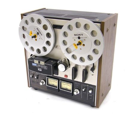 1970s Akai GX-210D reel-to-reel tape recorder, ser. no. K-81108-00429, with two spare tape reels, operating manual and leads