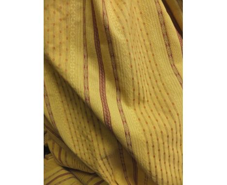 Two pairs of cotton lined curtains, the gold ground set with burgundy decoration together with matching scatter cushions COND