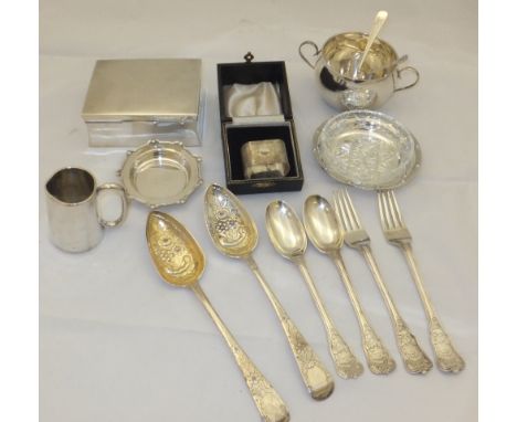 A box containing a collection of silver items to include a pair of berry spoons (London, 1818) with later decoration, two for