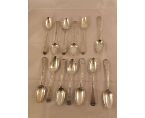 Two sets of five George III silver bright cut teaspoons together with a further three