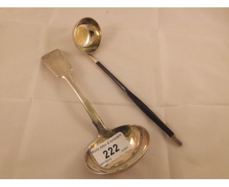 A Victorian toddy ladle with whale bone handle (London, 1879), set with a Georgian coin, together with an early 19th Century 