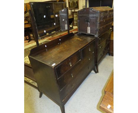 An early 20th Century oak dressing chest with mirrored back over two short and two long drawers, together with a mahogany dra