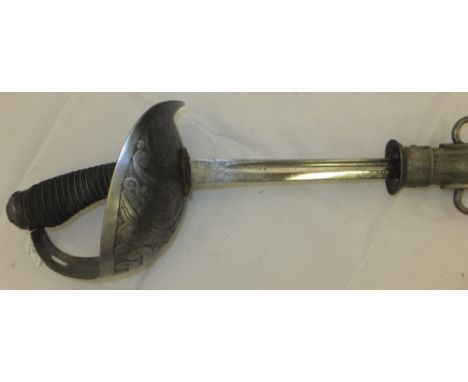 A 1912 pattern cavalry officer's sword by Wilkinson with scabbard CONDITION REPORTS Blade approx 88cm long.  Blade edge near 