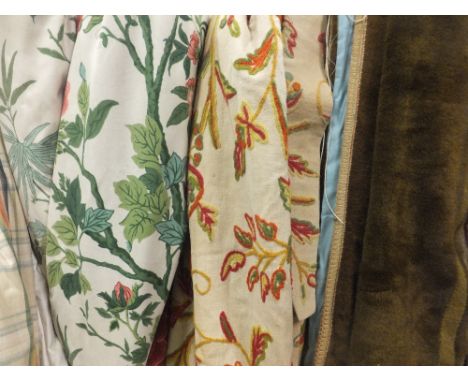 Three pairs of various curtains to include a pair of crewel work curtains and a pair of cotton interlined curtains, the cream